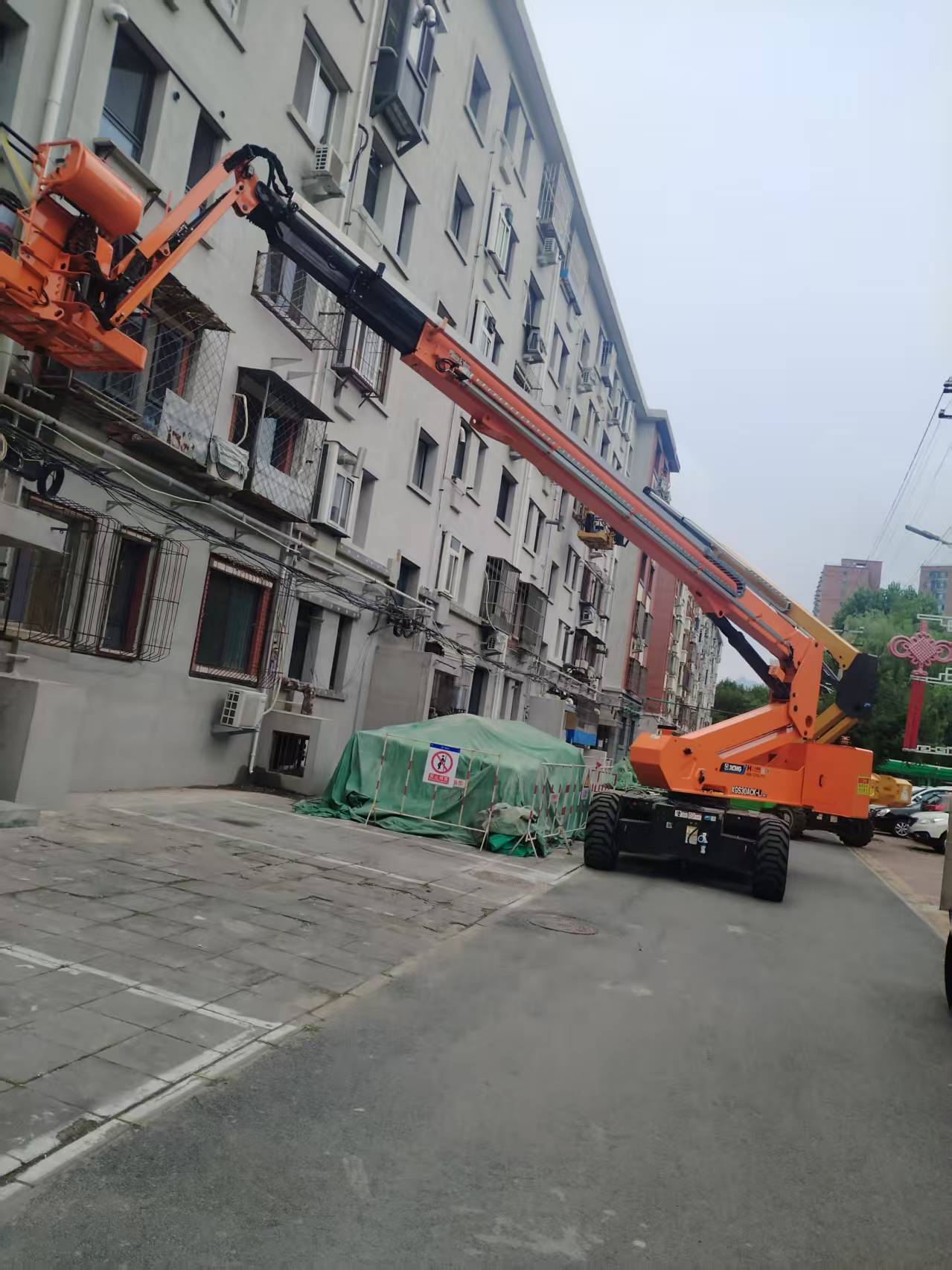 诠释都会更新厚度！LETOU乐投高机画出老旧小区刷新“同心圆”